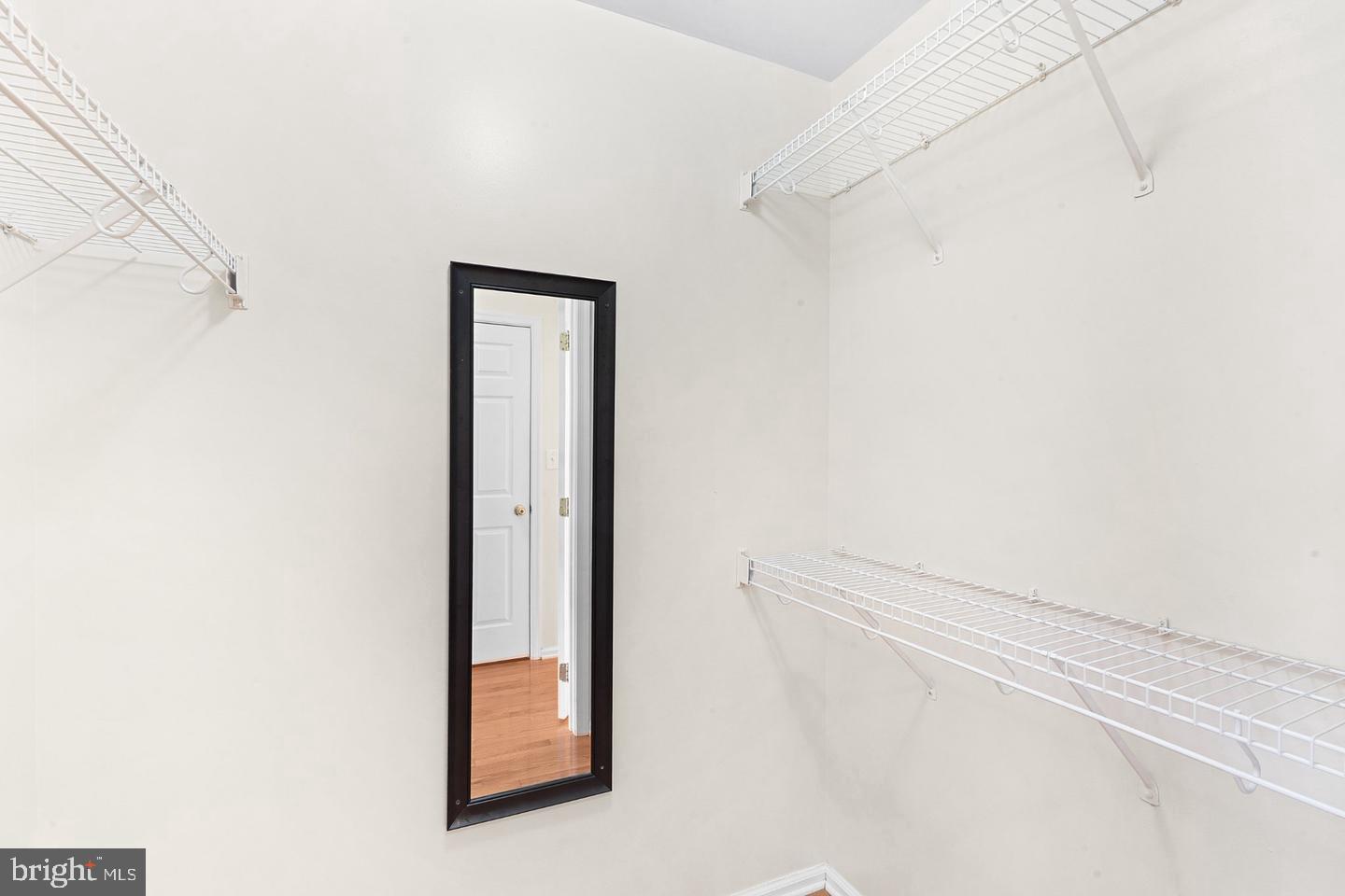 99 Warwick Road Princeton Junction, NJ 08550 - Photo 25 of 45 Spacious closet with sleek mirror.