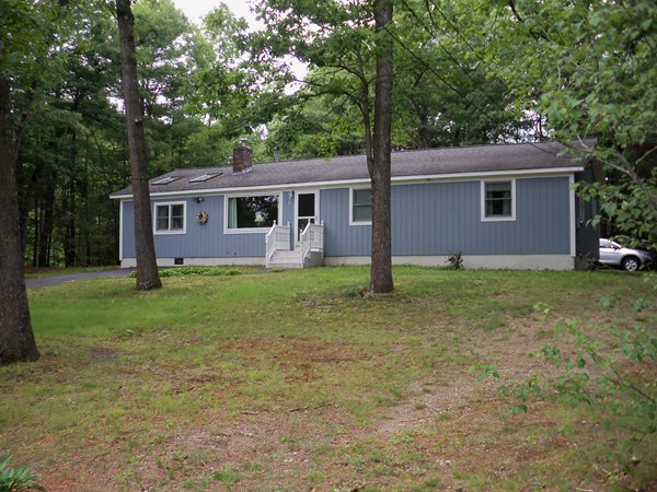 186 Ayer Road Shirley, MA 01464 - Photo 1 of 22 a view of a house with yard and tree s