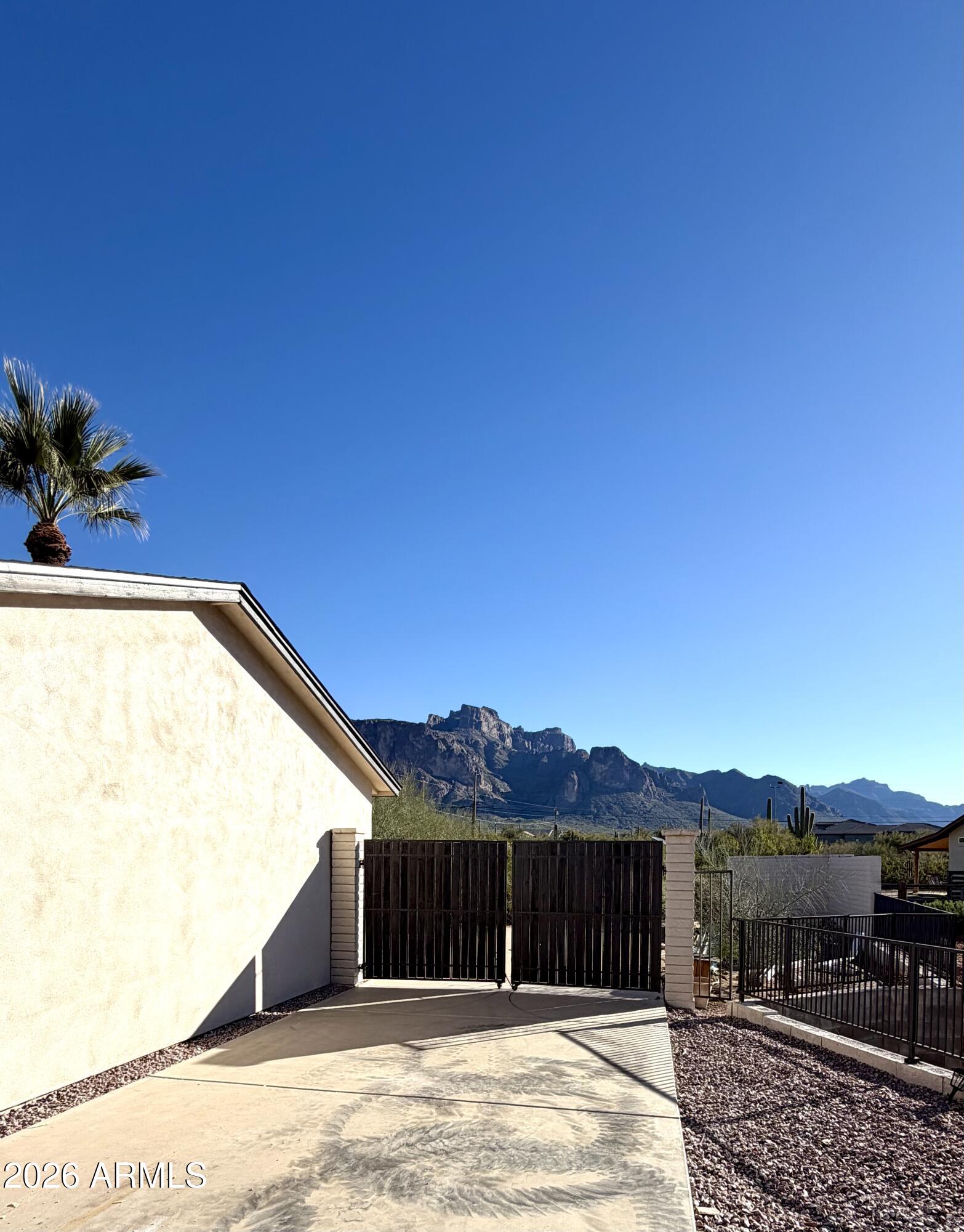 1165 North Mountain View Road Apache Junction, AZ 85119 - Photo 28 of 29 a view of balcony with a potted plants
