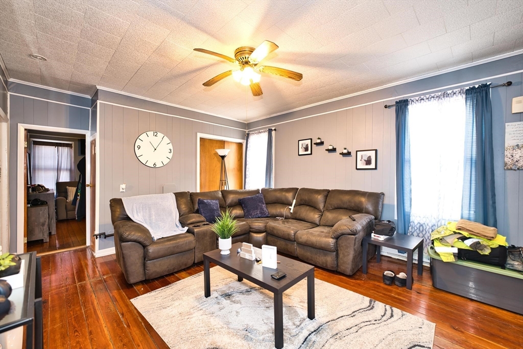 232 Alden Street Fall River, MA 02723 - Photo 7 of 34 a living room with furniture and a large window