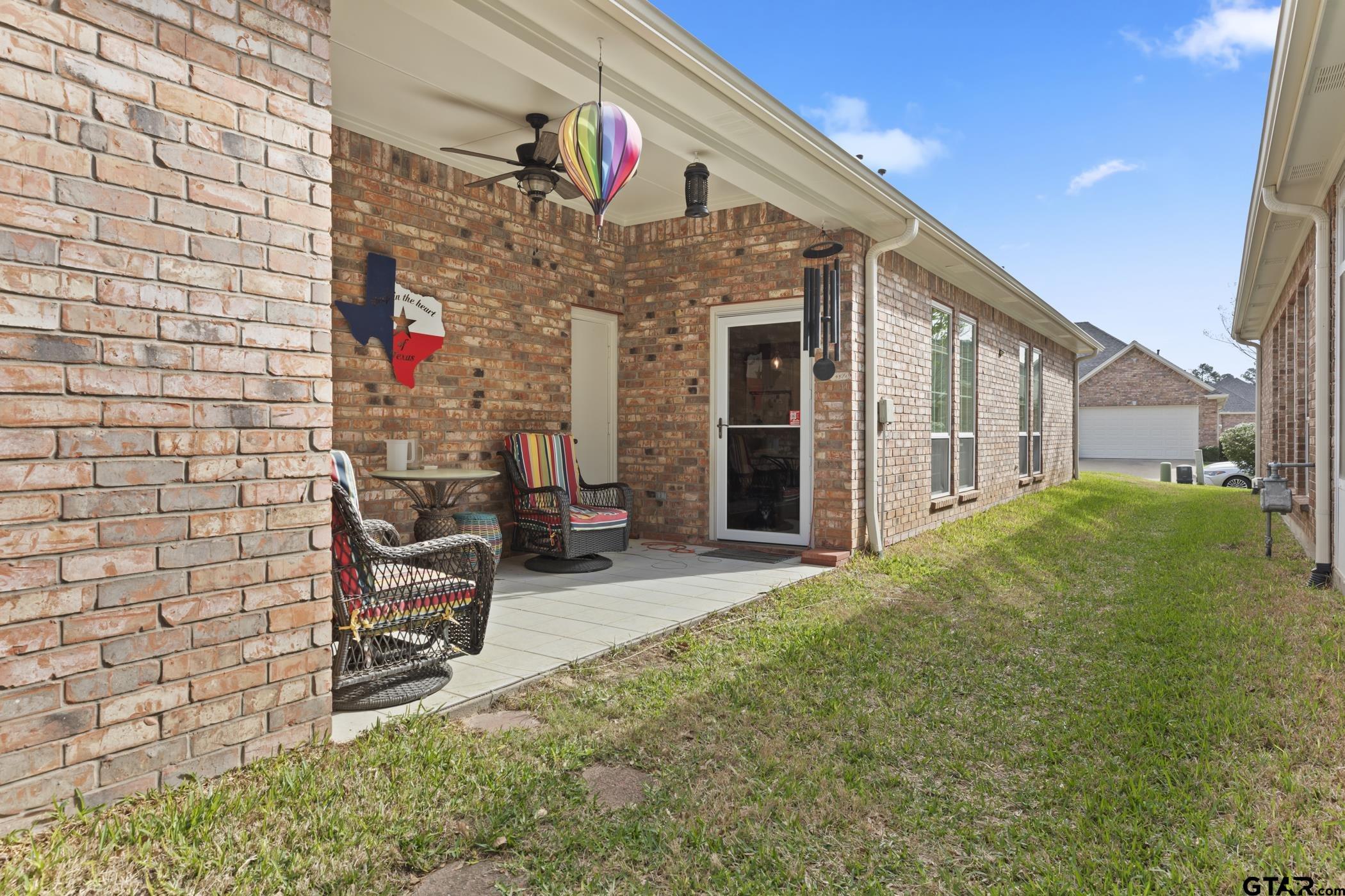 2315 Homestead Lane Tyler, TX 75701 - Photo 19 of 20 a view of a house with backyard and sitting area