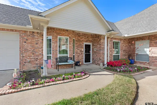front view of house with outdoor seating