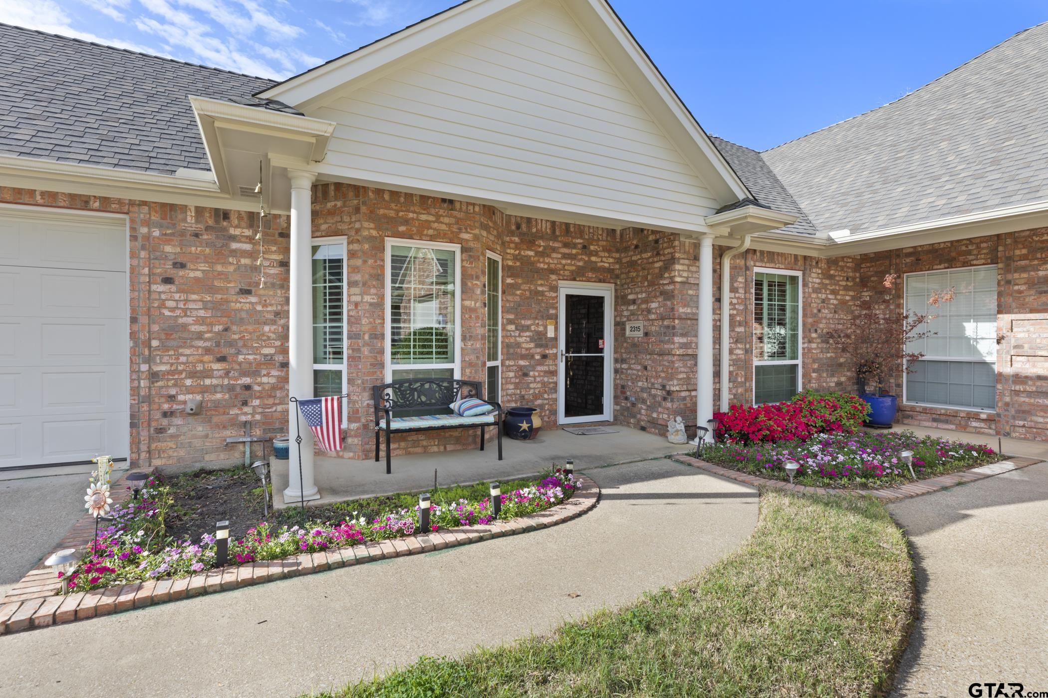 2315 Homestead Lane Tyler, TX 75701 - Photo 5 of 20 front view of house with outdoor seating