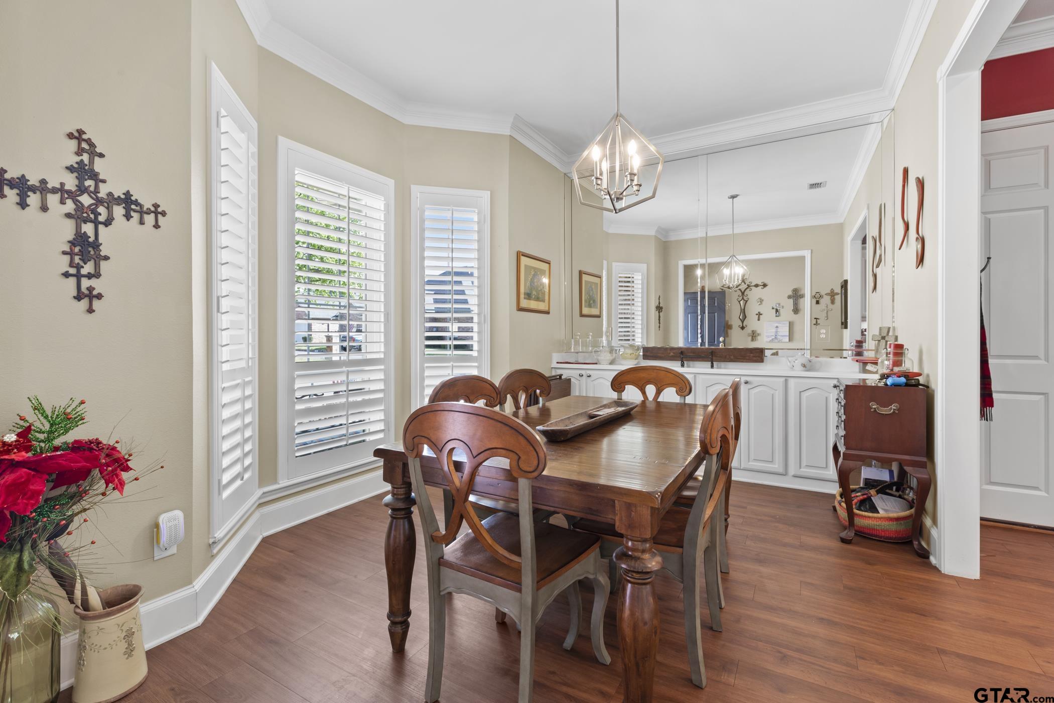 2315 Homestead Lane Tyler, TX 75701 - Photo 6 of 20 a view of a dining room with furniture and wooden floor