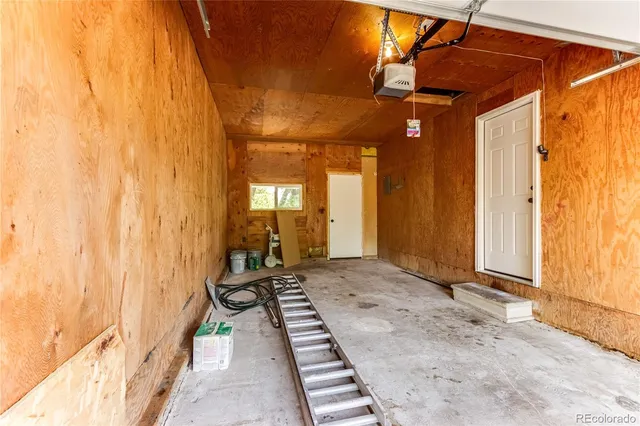 a view of a bathroom with a tub and shower