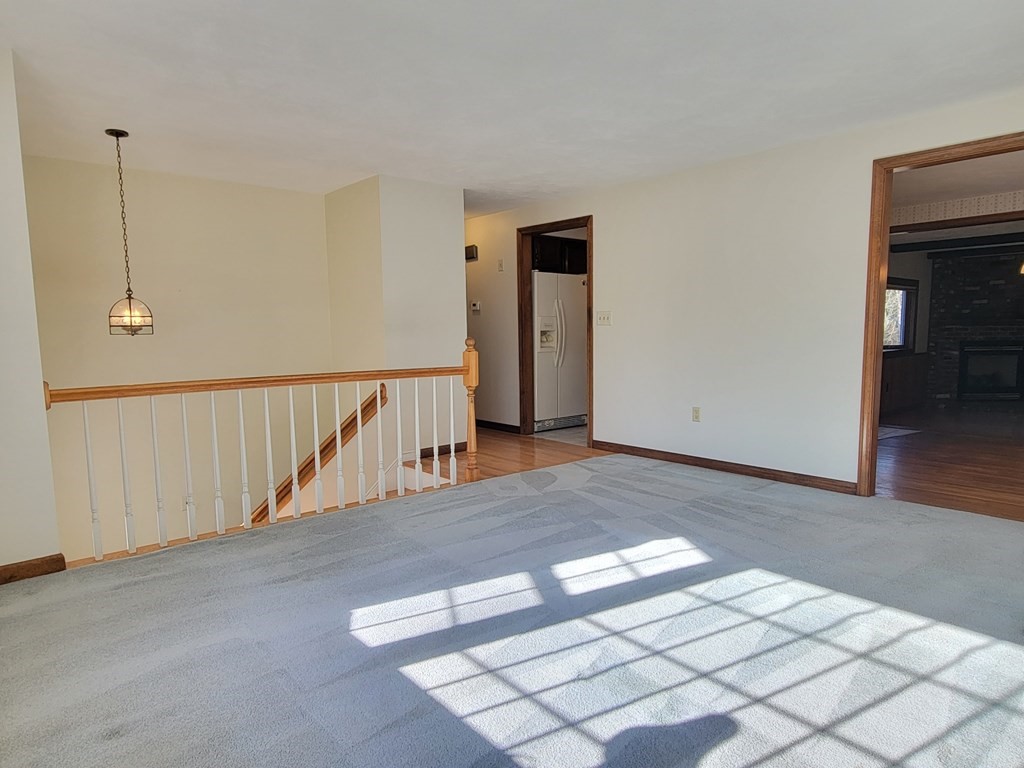 119 Cordaville Road Ashland, MA 01721 - Photo 8 of 32 a view of entryway and hall with wooden floor