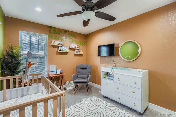 a room with furniture and a mirror