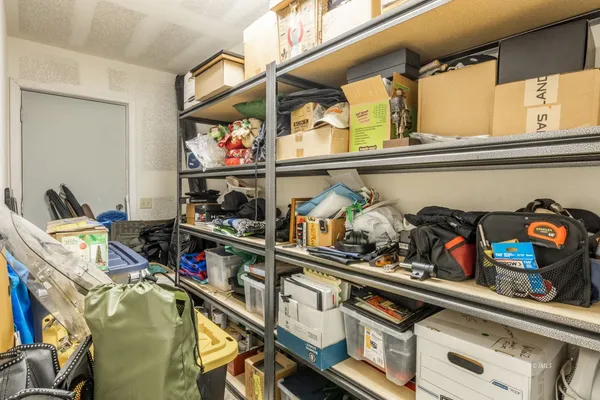 a room with storage and utility