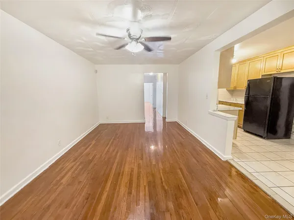 a view of a livingroom with wooden floor