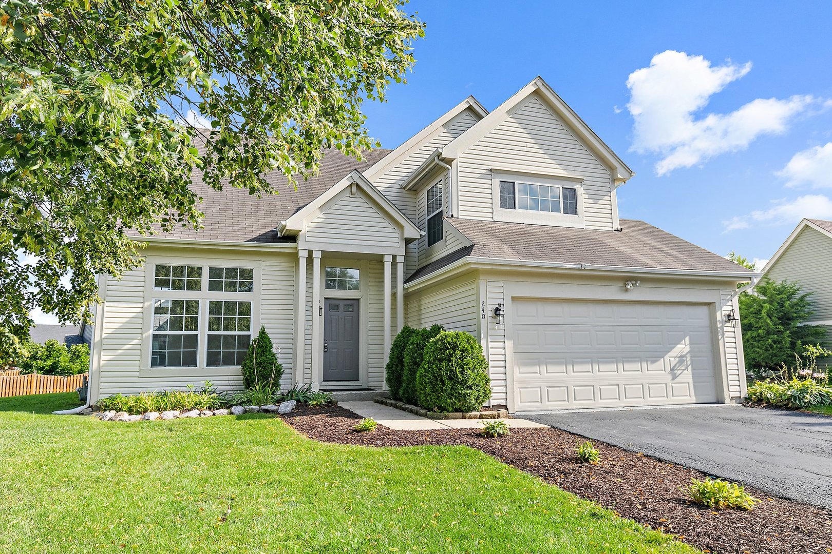 240 Penny Lane Bolingbrook, IL 60440 - Photo 1 of 22 front view of a house and a yard