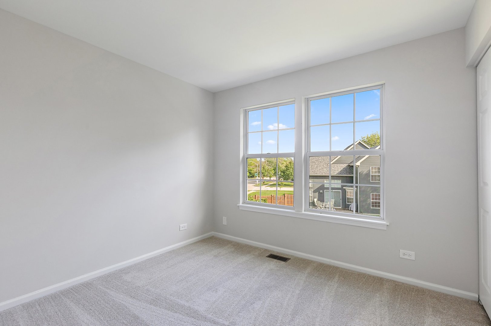 240 Penny Lane Bolingbrook, IL 60440 - Photo 15 of 22 an empty room with windows