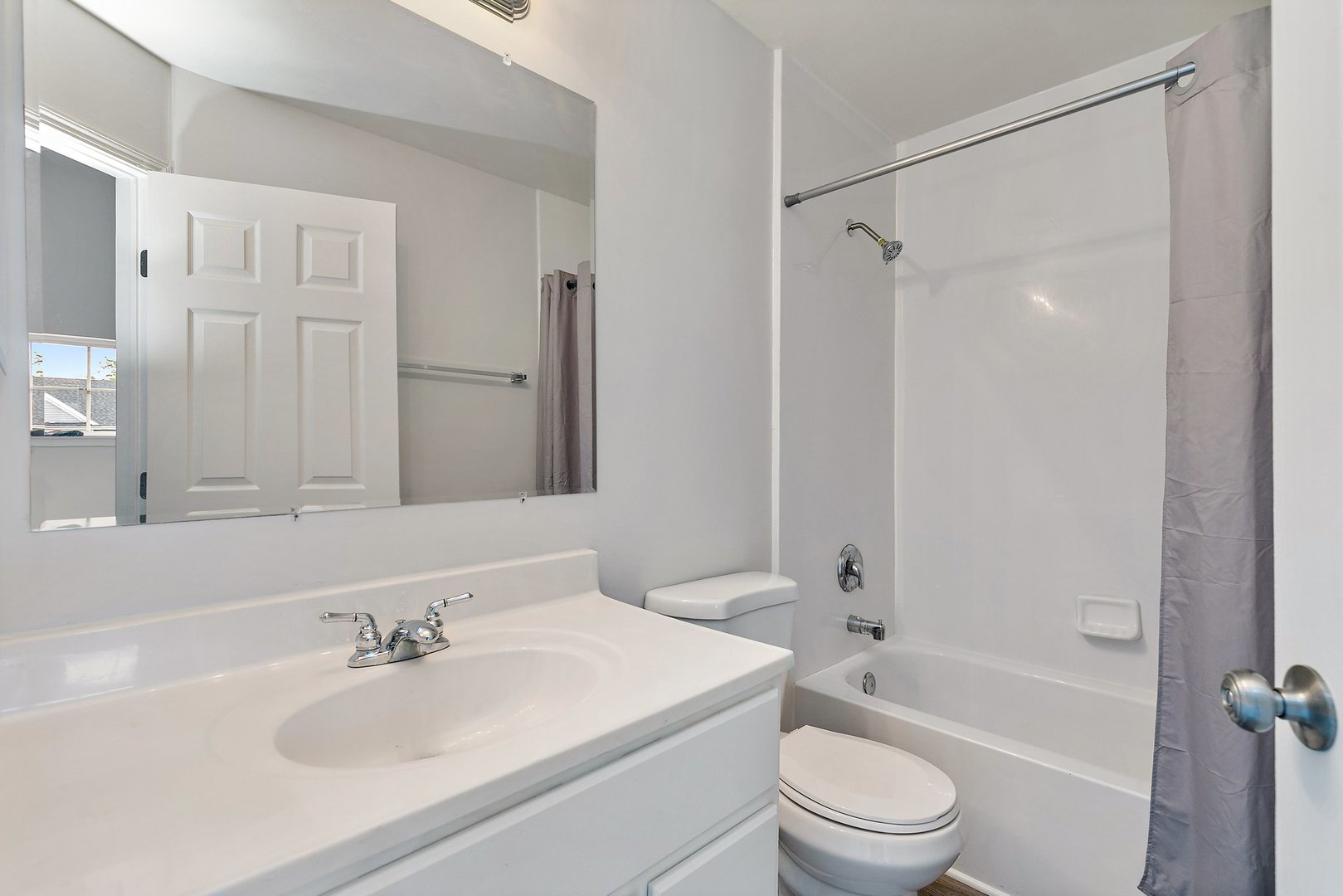 240 Penny Lane Bolingbrook, IL 60440 - Photo 20 of 22 a bathroom with a sink toilet tub and shower