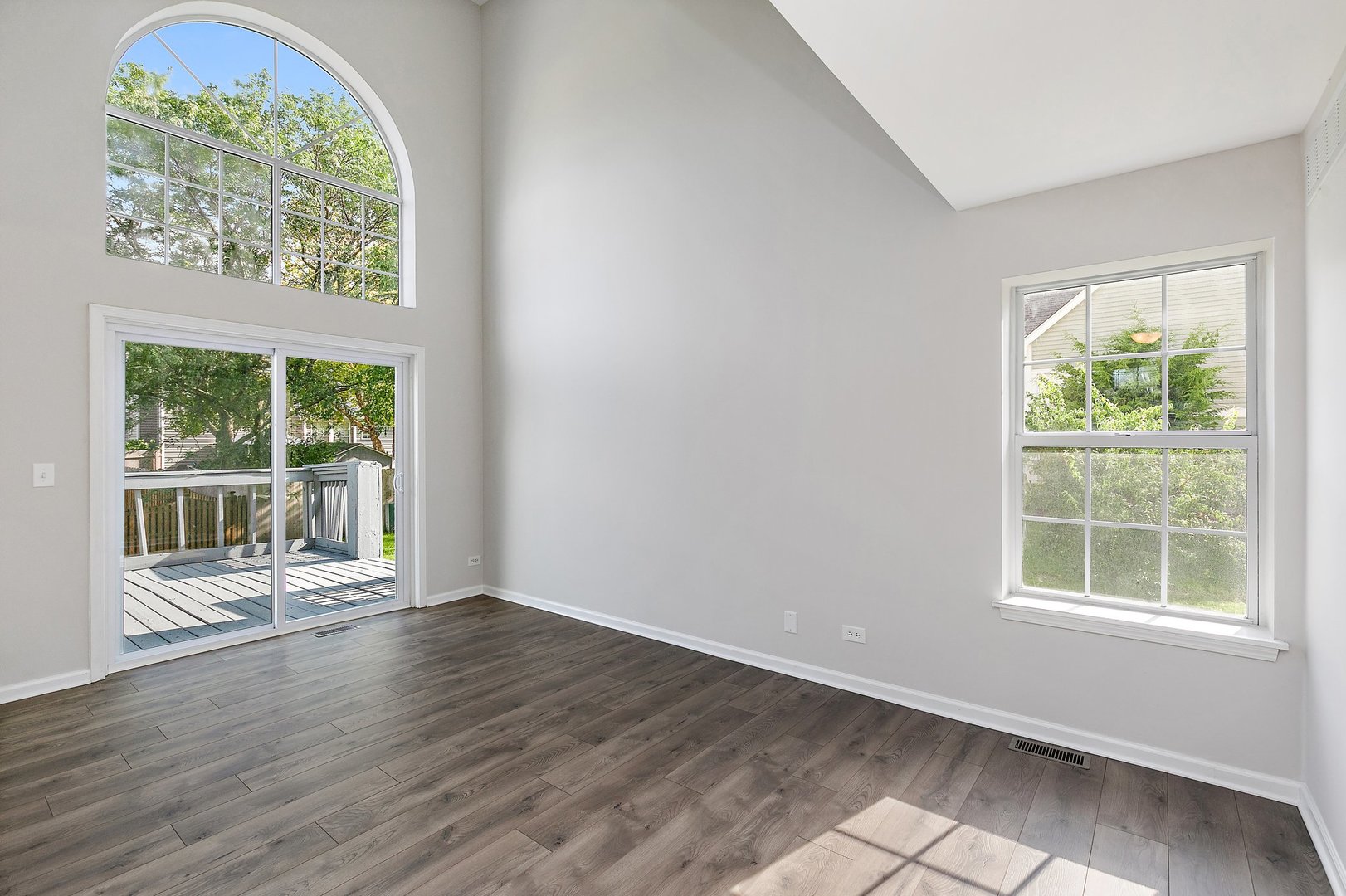 240 Penny Lane Bolingbrook, IL 60440 - Photo 10 of 22 an empty room with wooden floor and a window