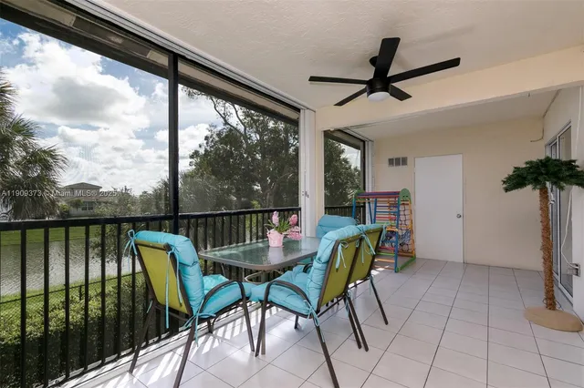 a view of a balcony with furniture