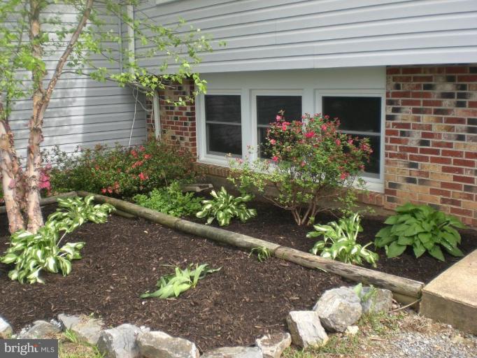3905 Boteler Road Mount Airy, MD 21771 - Photo 18 of 26 Front flower beds