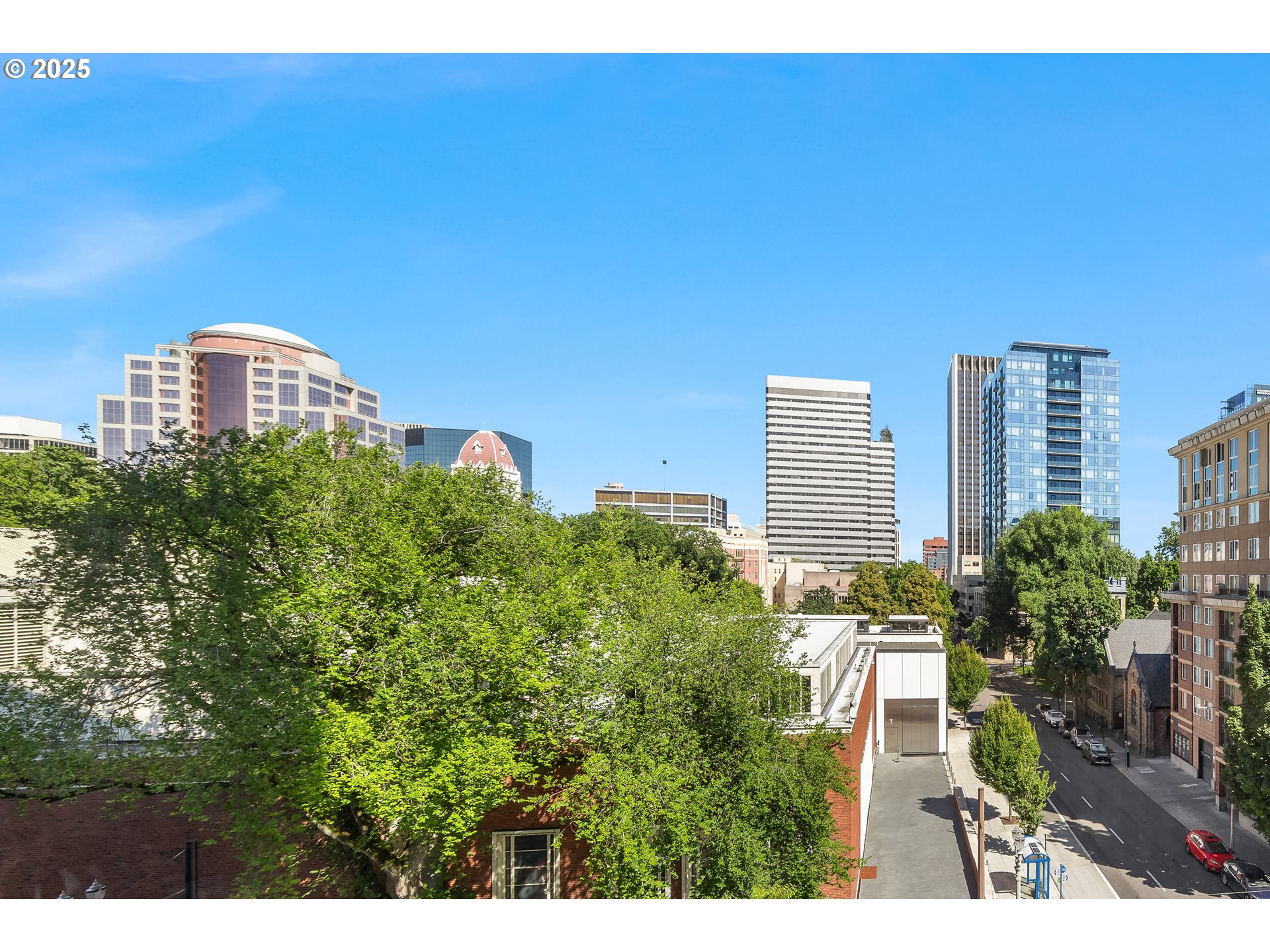 1221 Southwest 10th Avenue, Unit 505 Portland, OR 97205 - Photo 13 of 41 a view of a city with tall buildings in the background