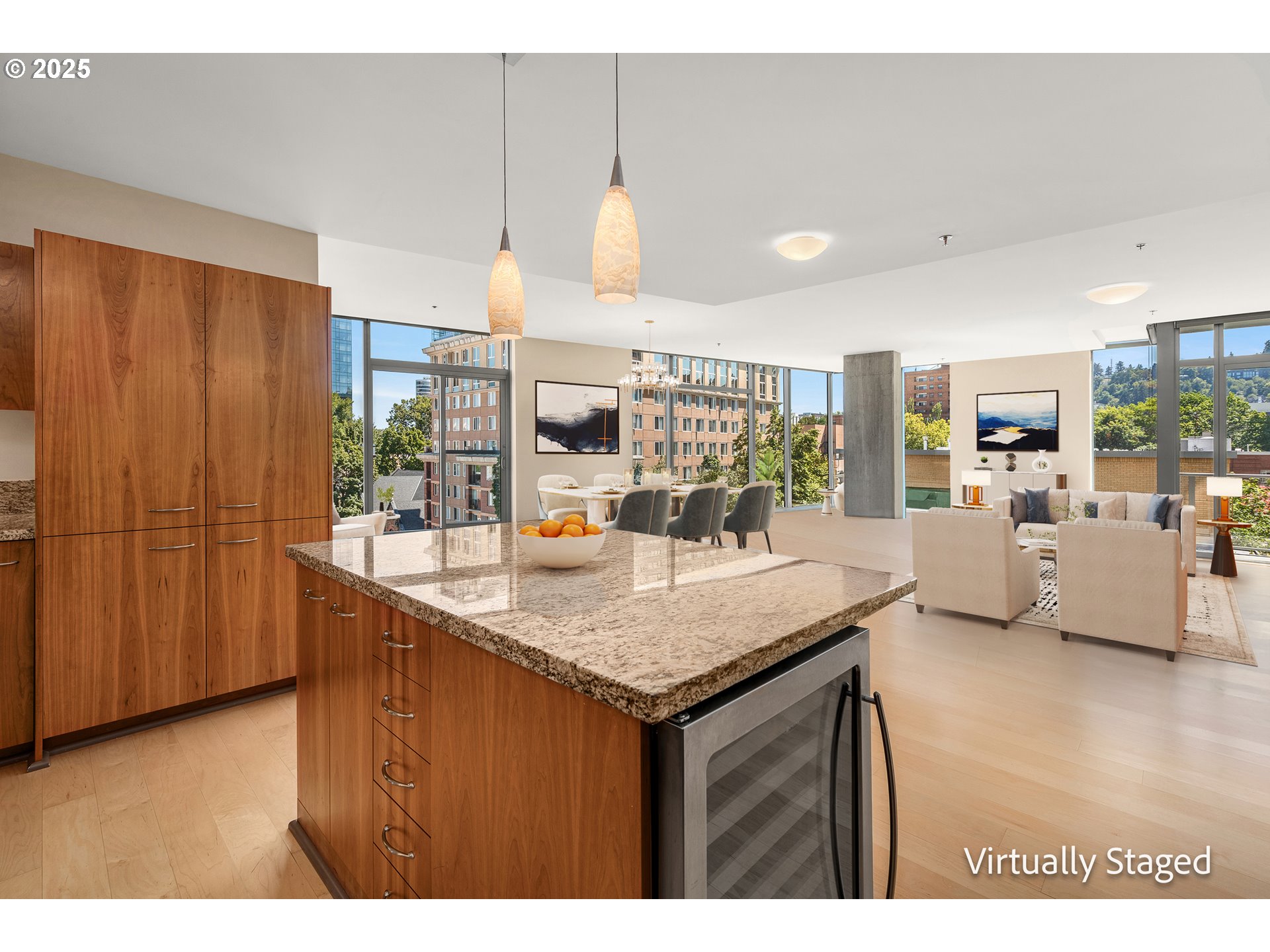 1221 Southwest 10th Avenue, Unit 505 Portland, OR 97205 - Photo 15 of 41 a kitchen with stainless steel appliances granite countertop a sink a counter space and cabinets