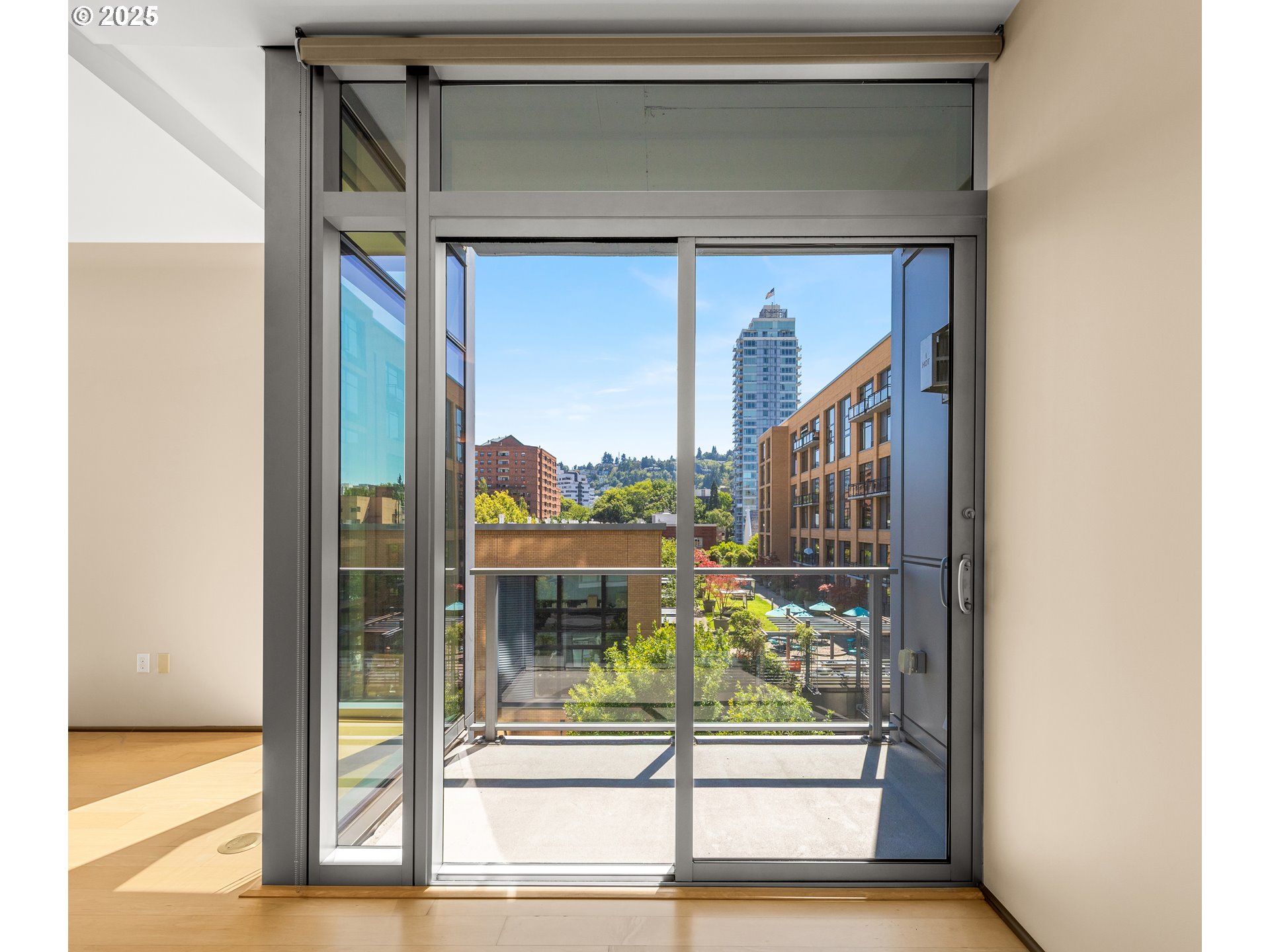 1221 Southwest 10th Avenue, Unit 505 Portland, OR 97205 - Photo 19 of 41 a picture of a glass door of the house