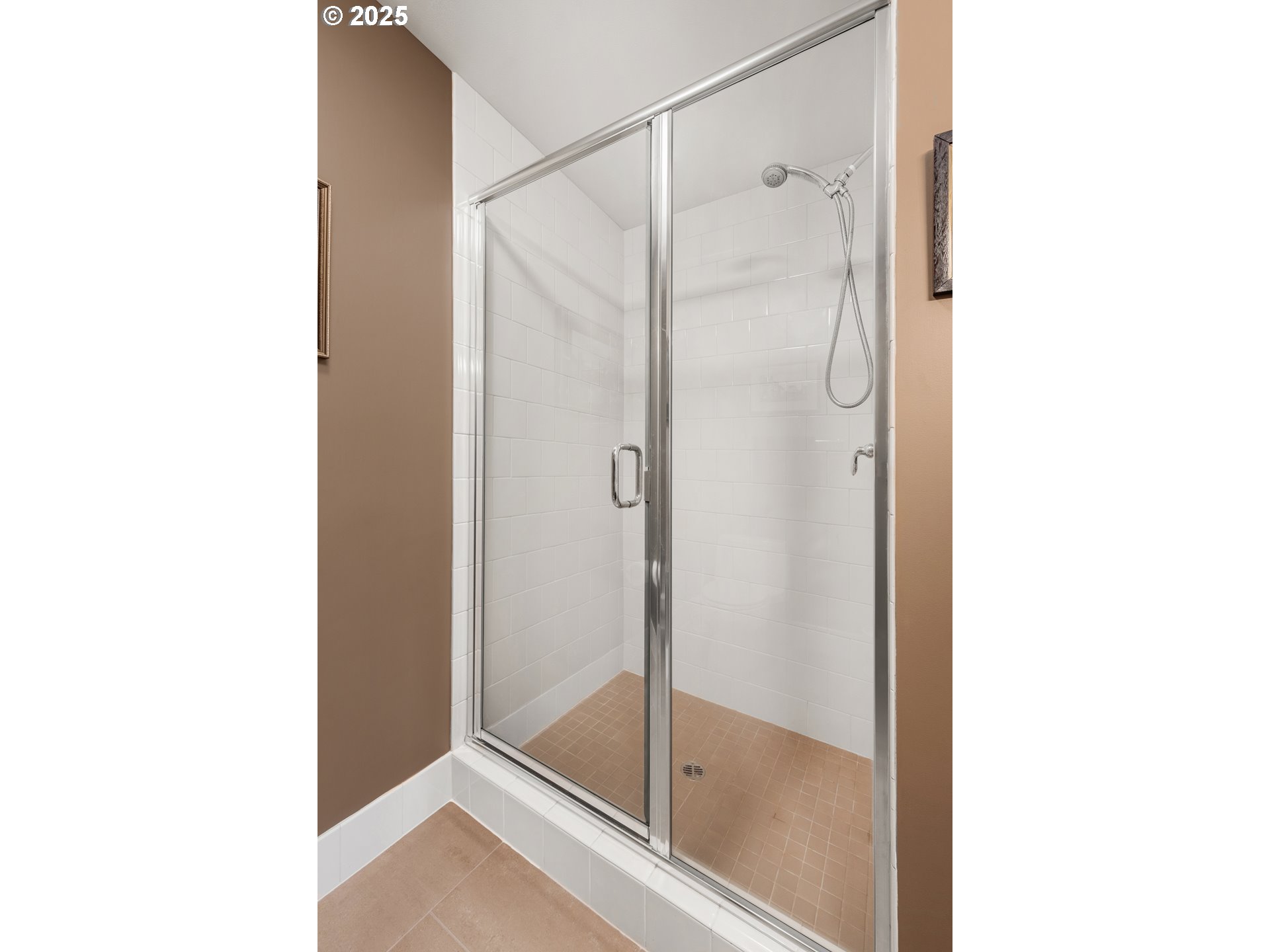 1221 Southwest 10th Avenue, Unit 505 Portland, OR 97205 - Photo 29 of 41 a bathroom with a glass shower door