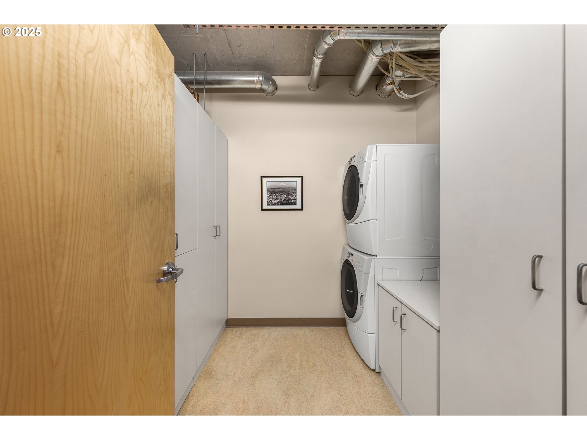 1221 Southwest 10th Avenue, Unit 505 Portland, OR 97205 - Photo 30 of 41 a utility room with dryer and washer