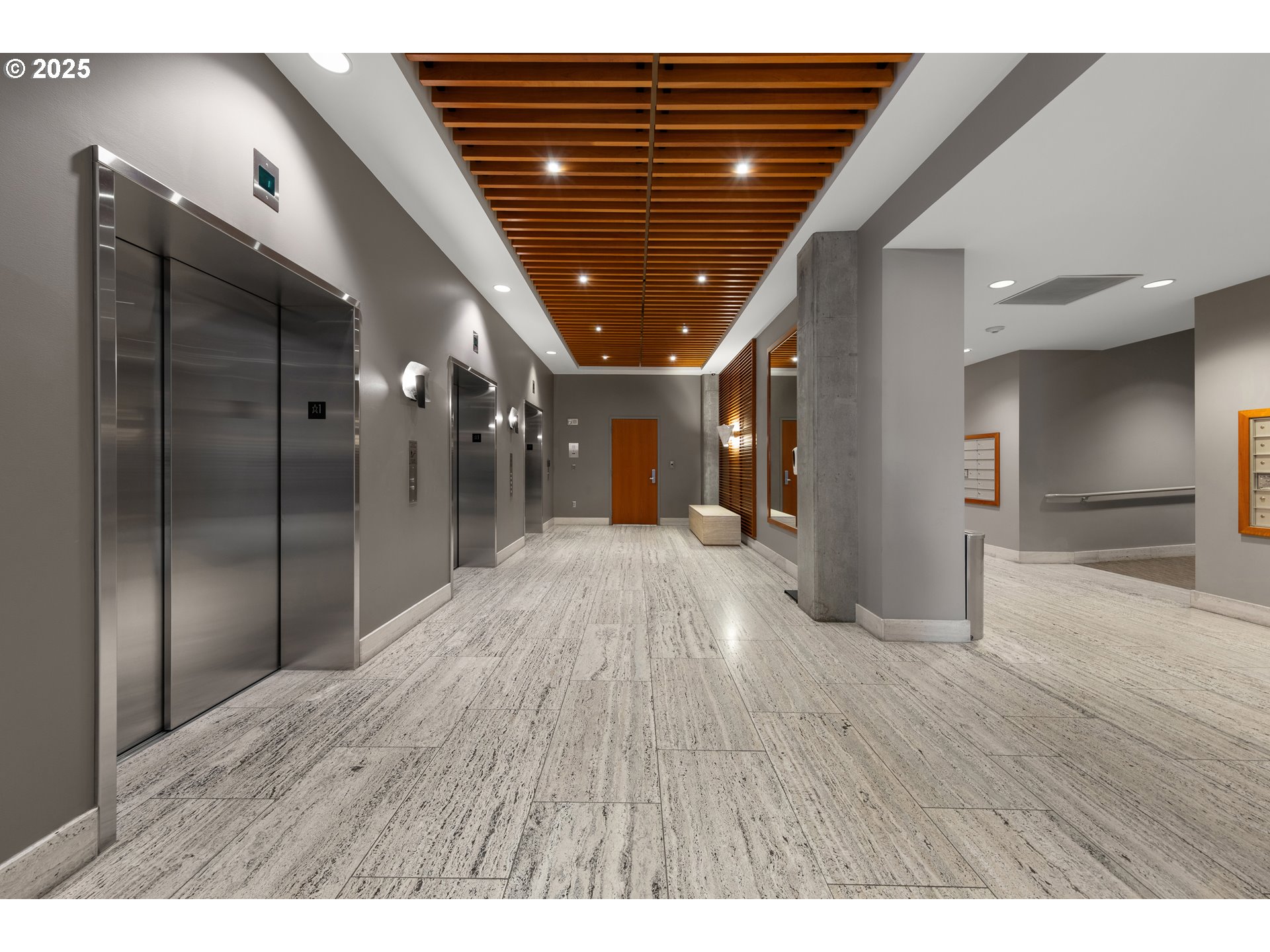 1221 Southwest 10th Avenue, Unit 505 Portland, OR 97205 - Photo 33 of 41 a view of hallway with wooden floor