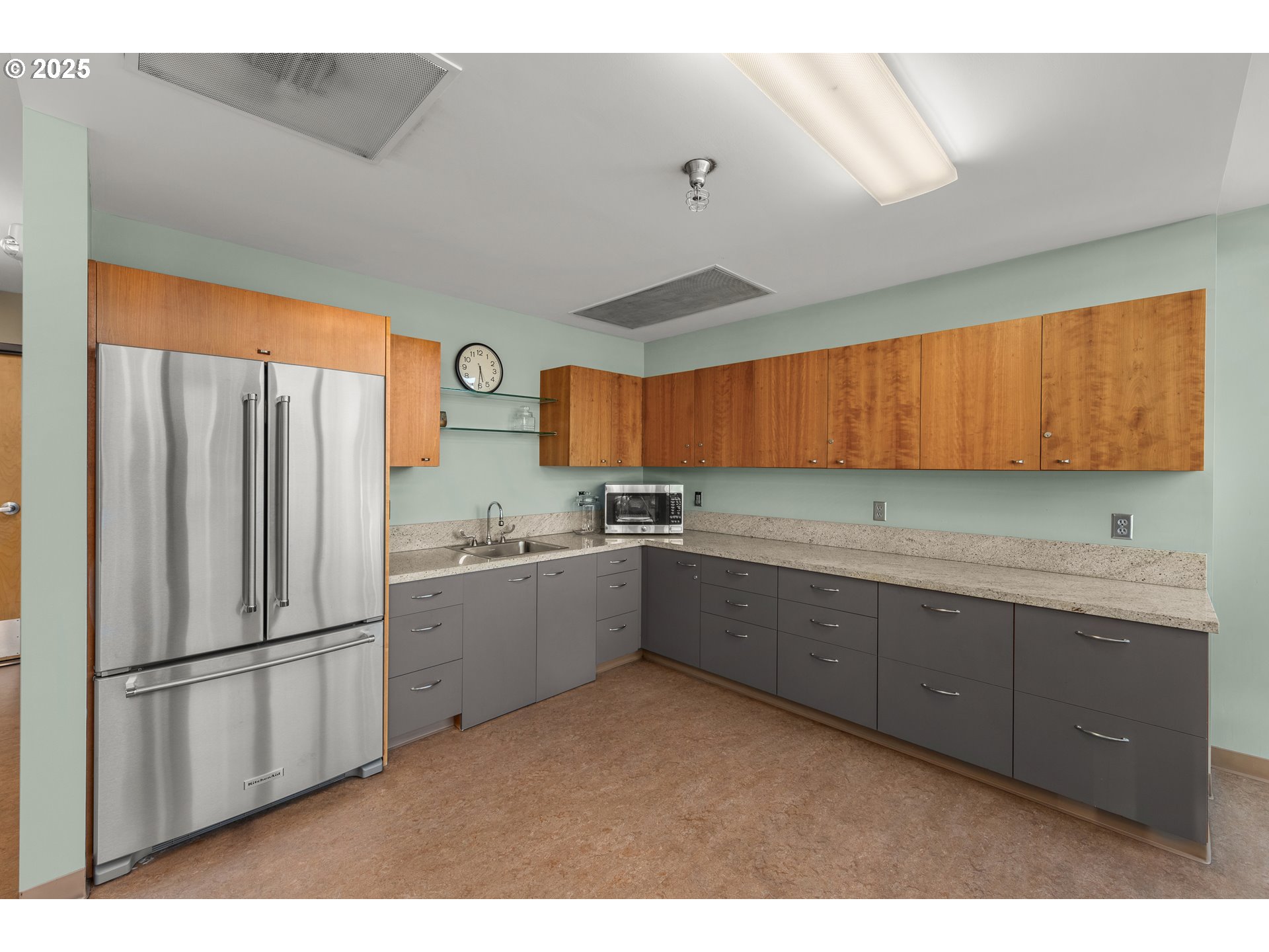 1221 Southwest 10th Avenue, Unit 505 Portland, OR 97205 - Photo 38 of 41 a kitchen with a sink and refrigerator