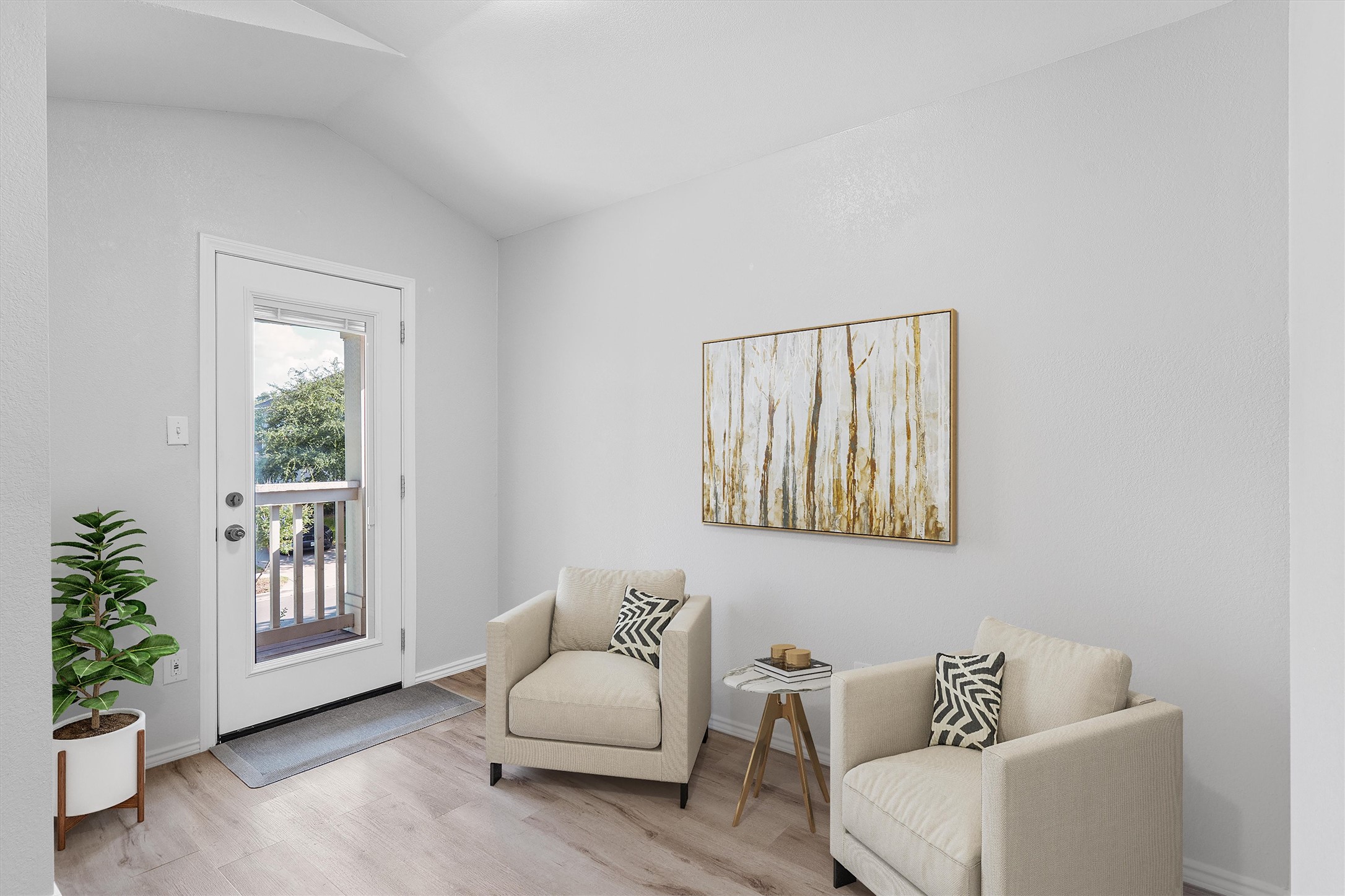1833 Thompson Trail Round Rock, TX 78664 - Photo 18 of 40 Vaulted ceilings elevate this cozy living area, creating an airy and inviting atmosphere perfect for relaxation.