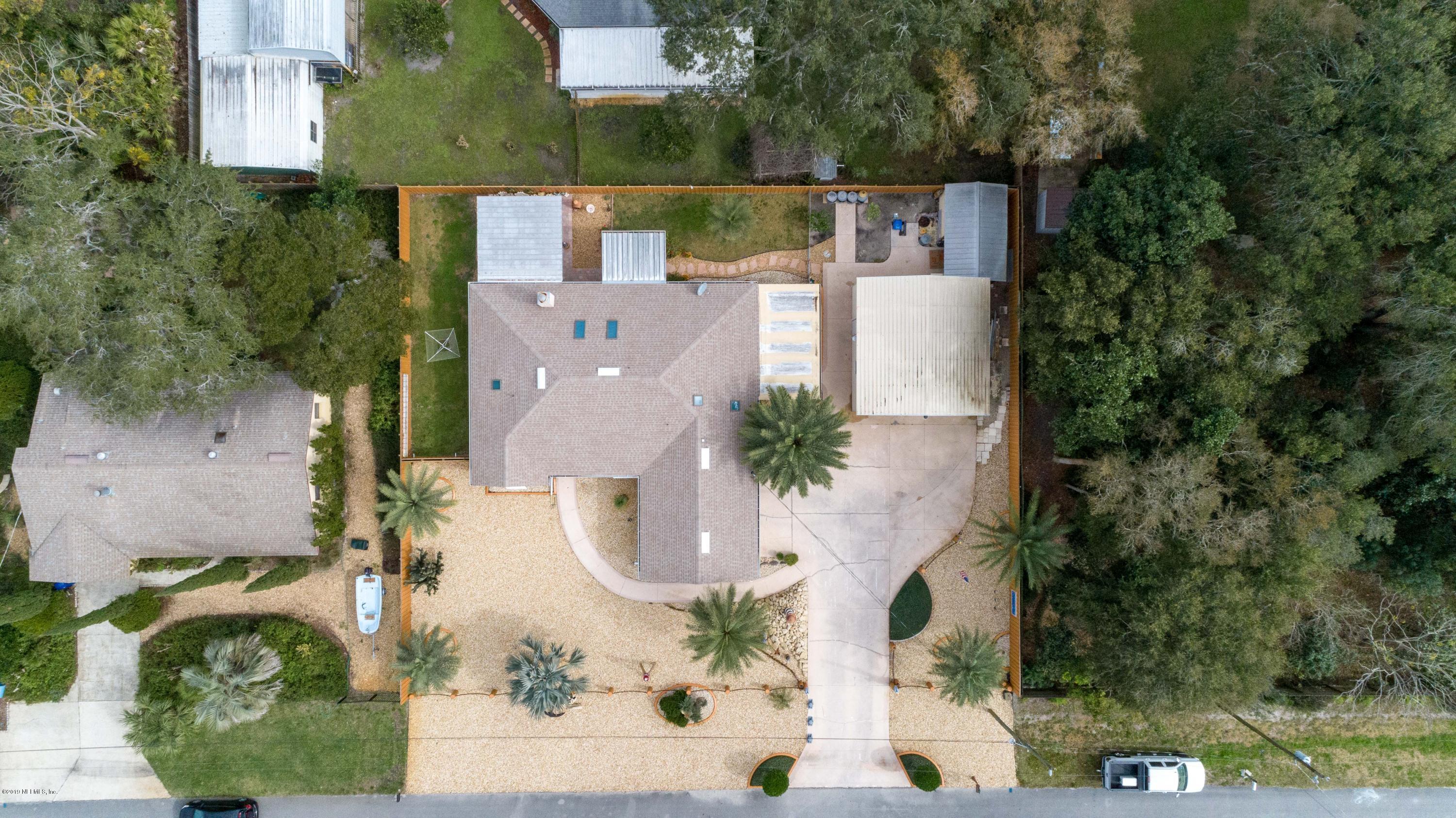 367 Shamrock Road St. Augustine, FL 32086 - Photo 49 of 58 an aerial view of a house with a yard and a fountain