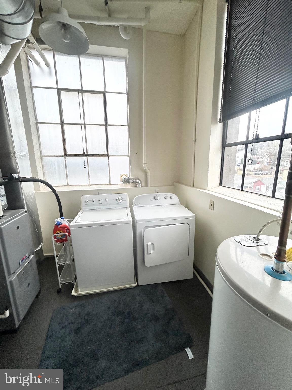 31 South Sterley Street, Unit 401 Reading, PA 19607 - Photo 12 of 12 a utility room with dryer and washer