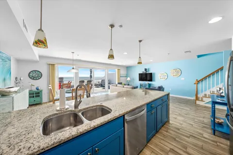 a view of roof deck with furniture