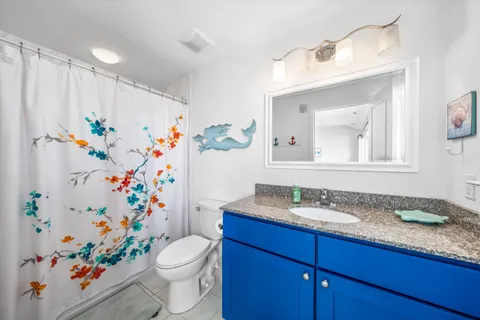 a view of a living room with a rug