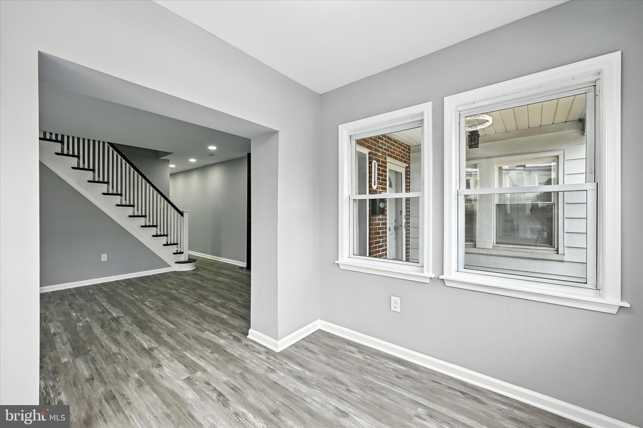 1118 Weldon Avenue Baltimore, MD 21211 - Photo 7 of 27 a view of an entryway with wooden floor