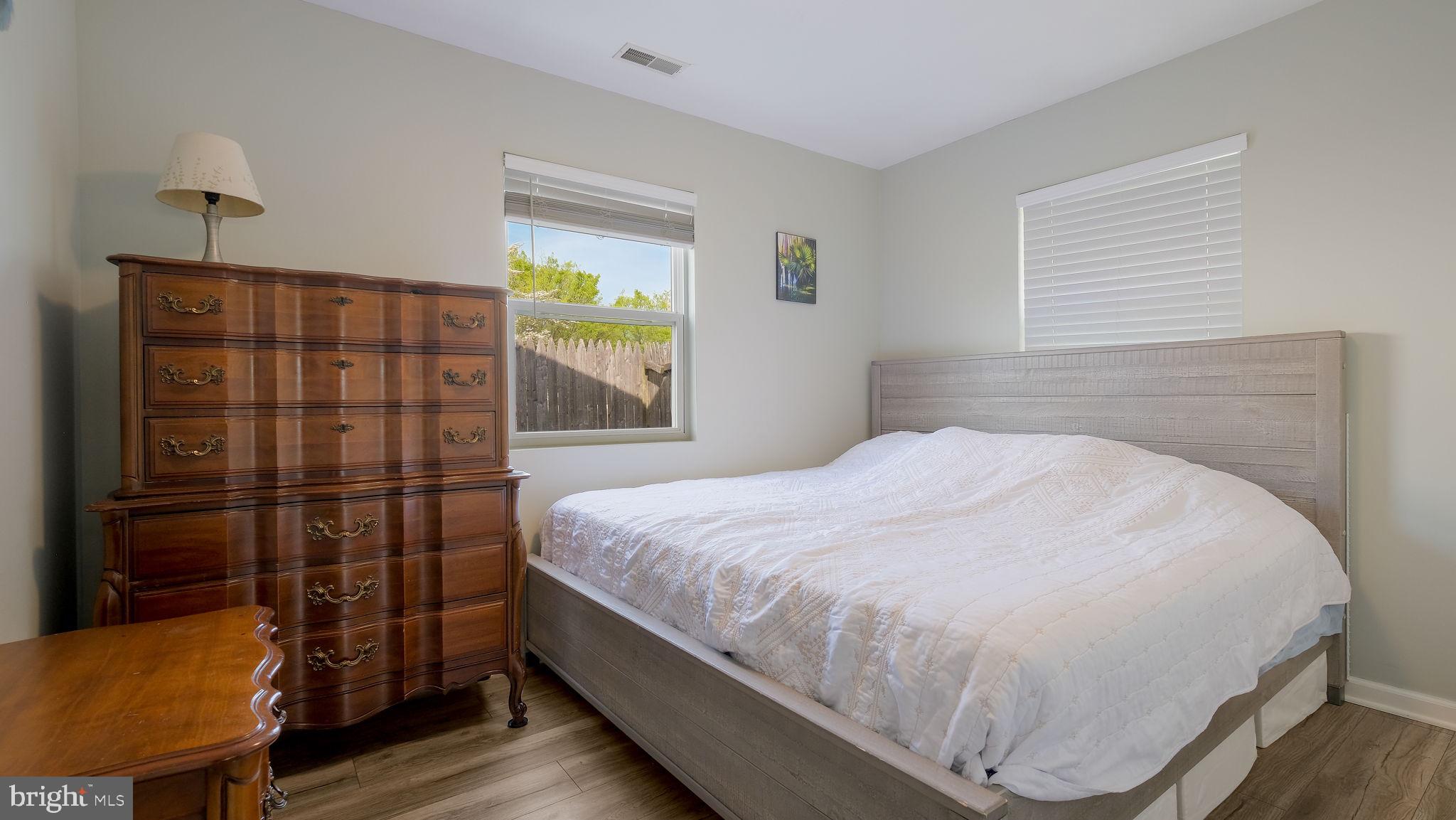 1706 Susan Avenue Croydon, PA 19021 - Photo 17 of 26 a bedroom with a bed and wooden floor