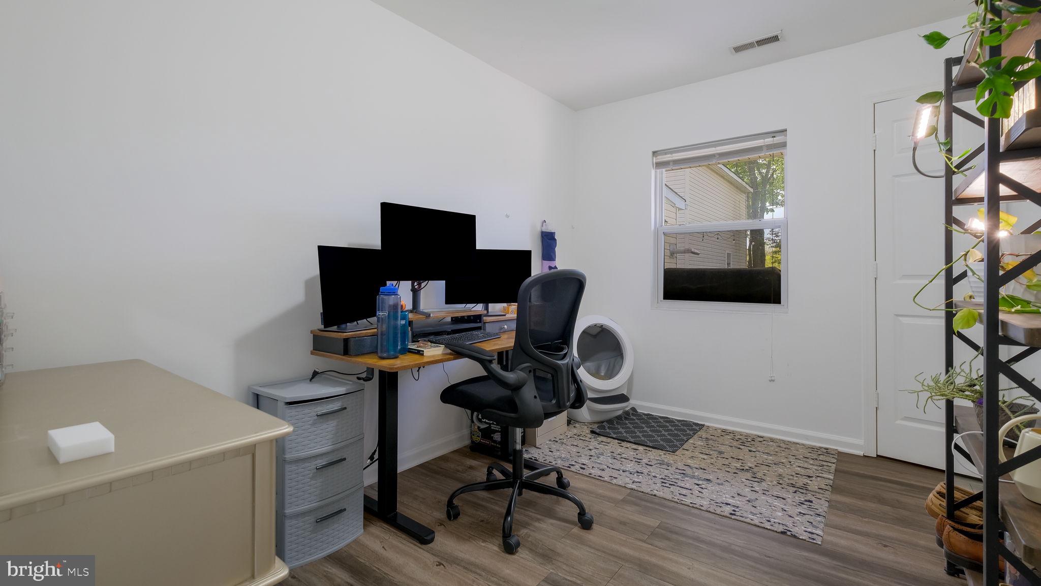 1706 Susan Avenue Croydon, PA 19021 - Photo 18 of 26 a view of a workspace with furniture and a window