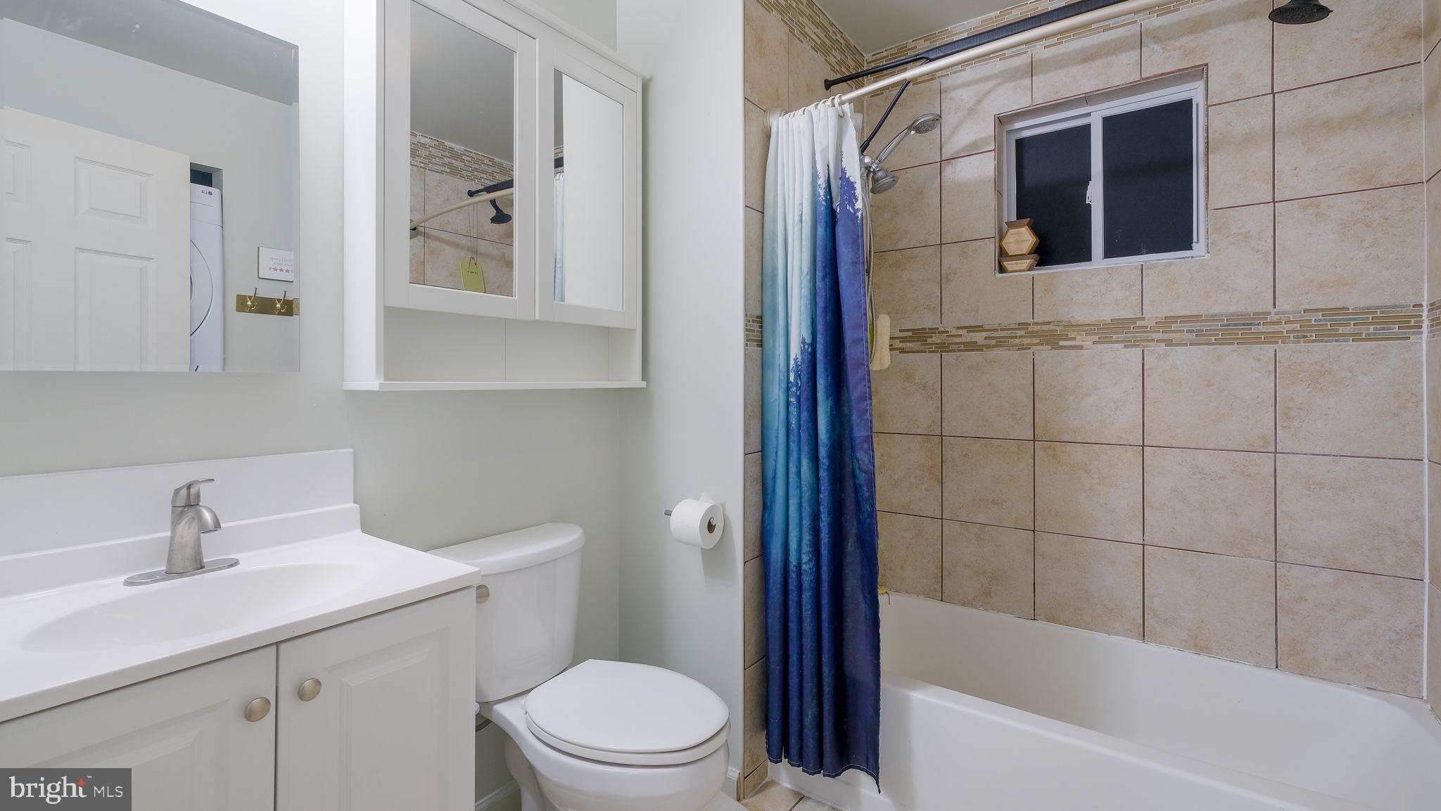 1706 Susan Avenue Croydon, PA 19021 - Photo 19 of 26 a bathroom with a sink a toilet and shower