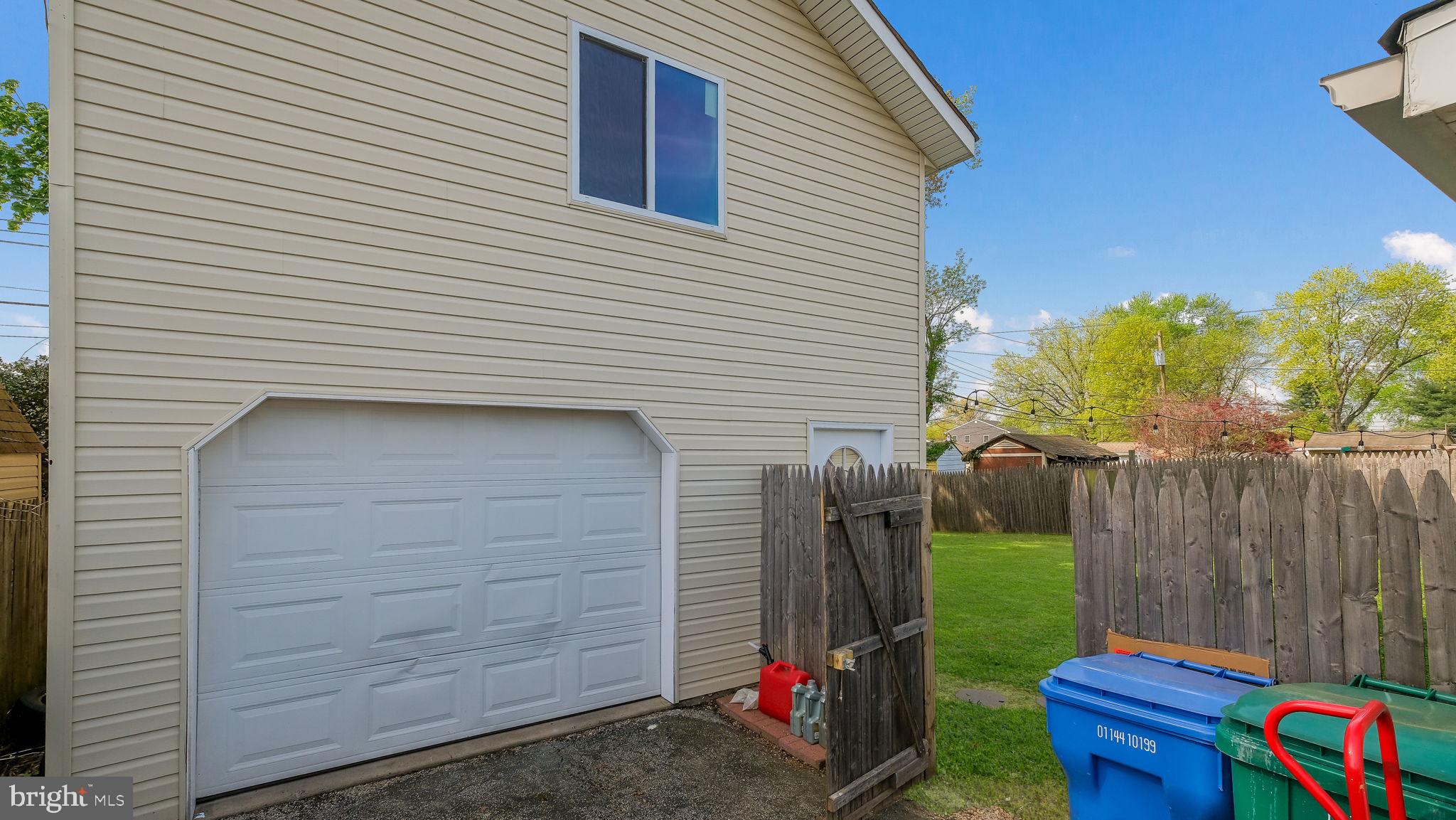1706 Susan Avenue Croydon, PA 19021 - Photo 21 of 26 a view of a backyard with a small cabin and a chair