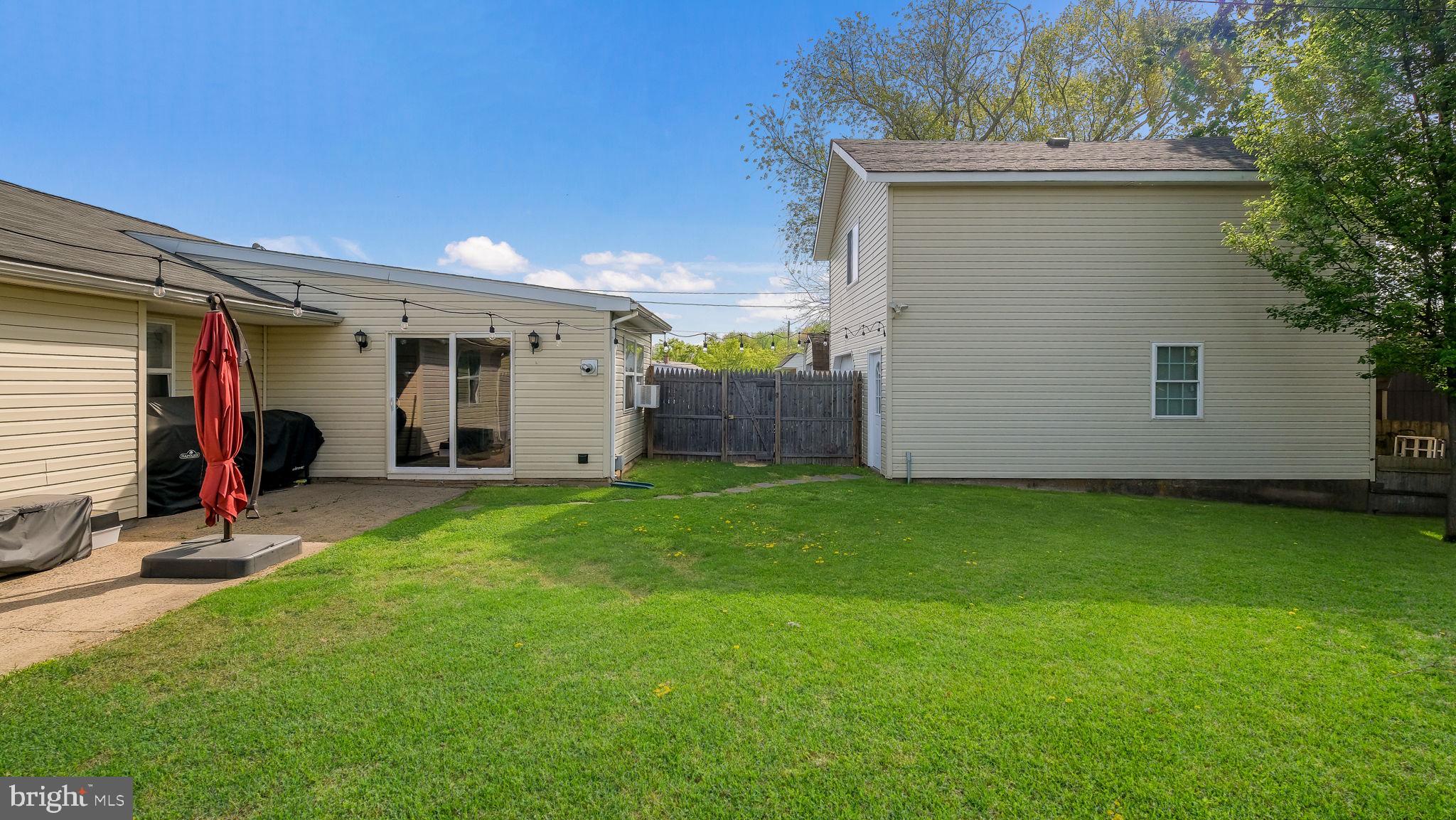 1706 Susan Avenue Croydon, PA 19021 - Photo 25 of 26 a view of a backyard with a large tree