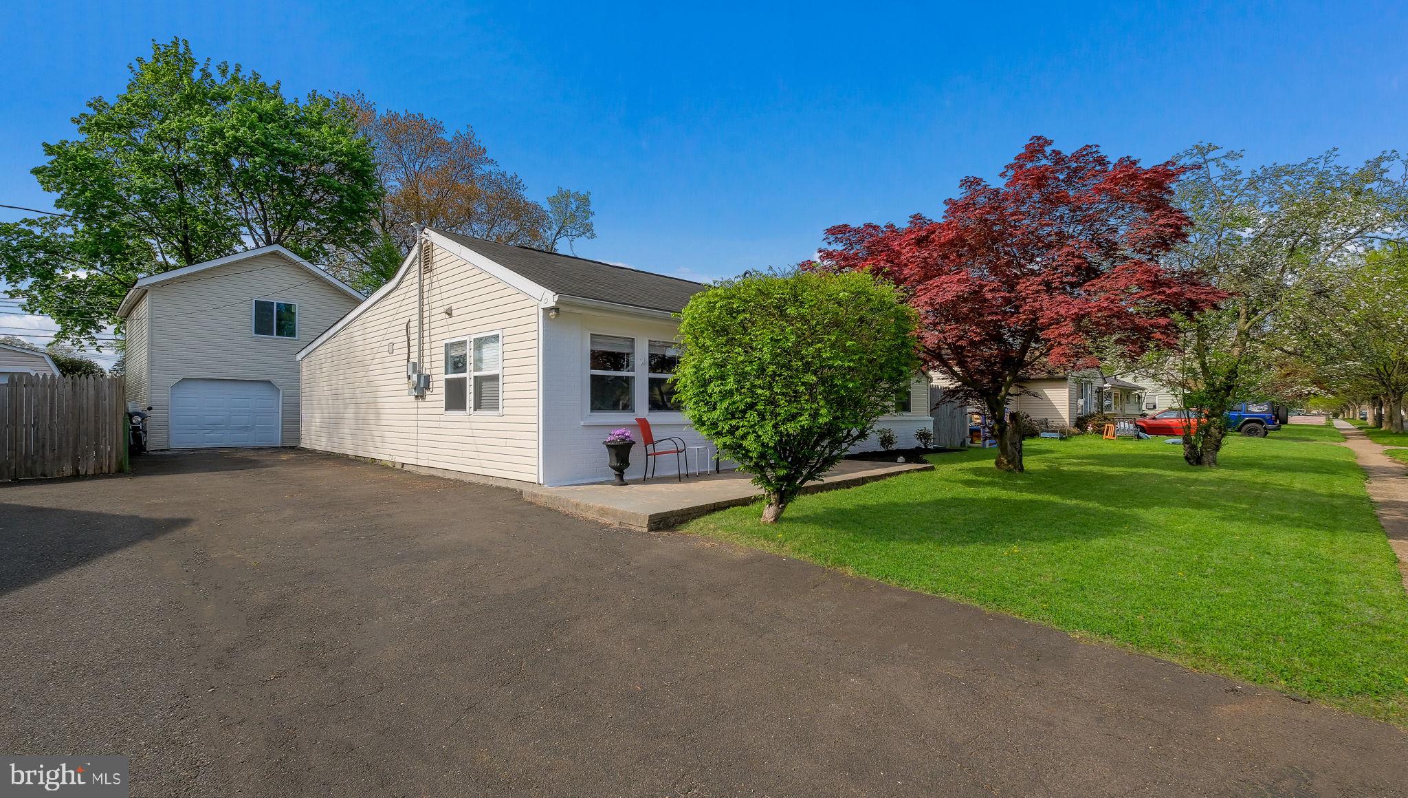1706 Susan Avenue Croydon, PA 19021 - Photo 3 of 26 a view of a house with a yard and tree s