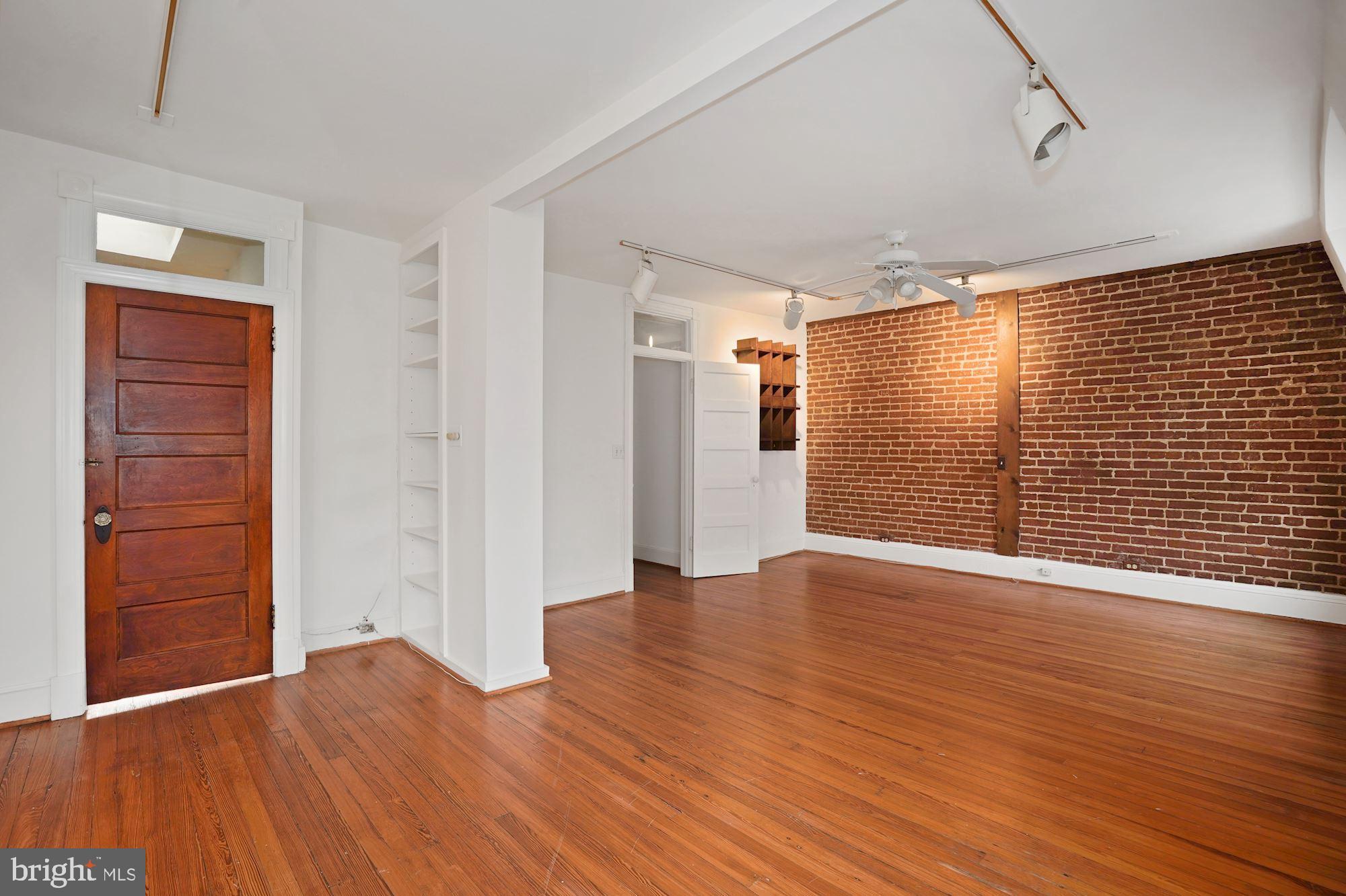 2805 Ontario Road Northwest Washington, DC 20009 - Photo 30 of 42 Georgous exposed brick wall