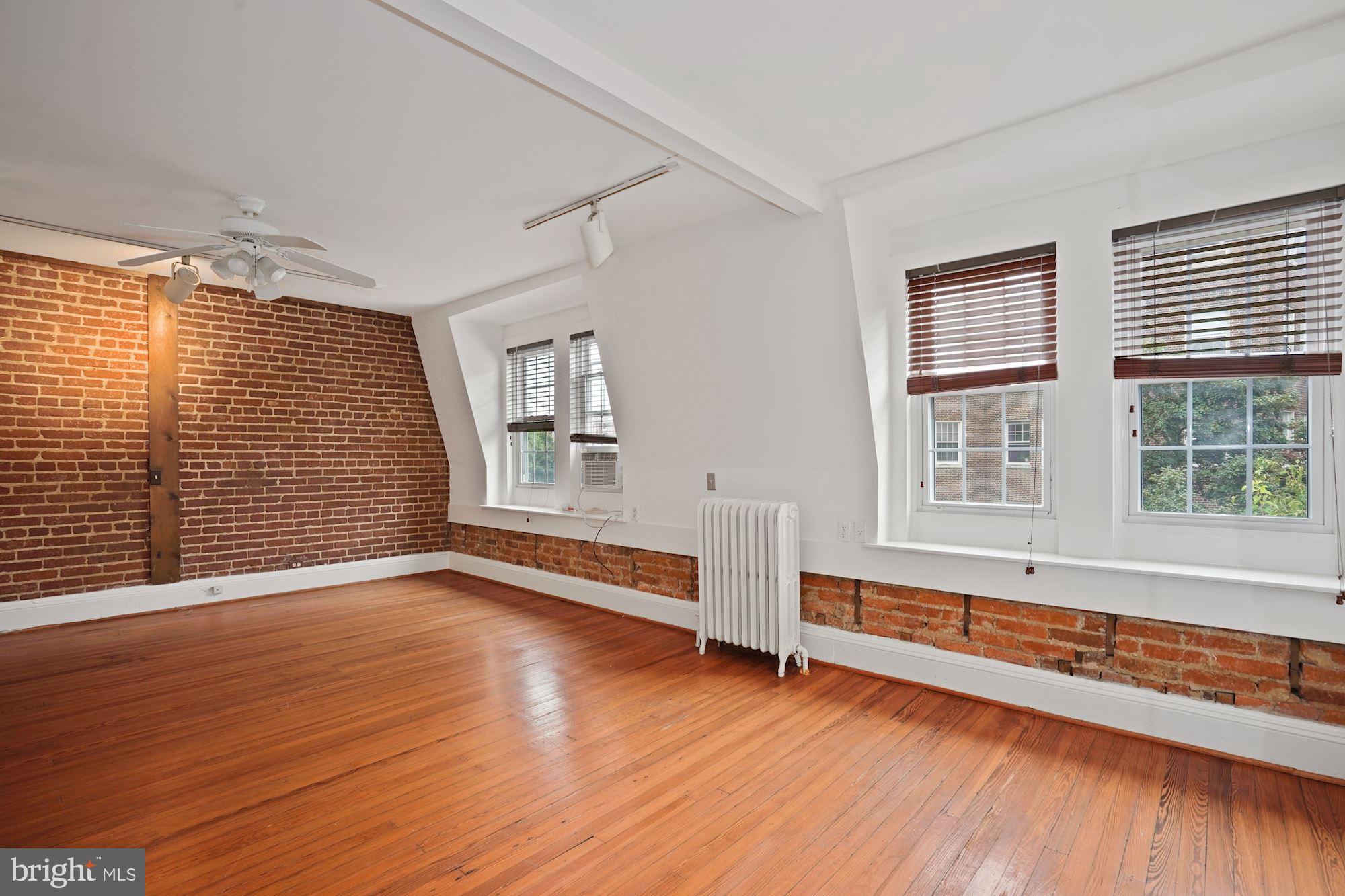 2805 Ontario Road Northwest Washington, DC 20009 - Photo 31 of 42 Gleaming wood floors & a ton of windows