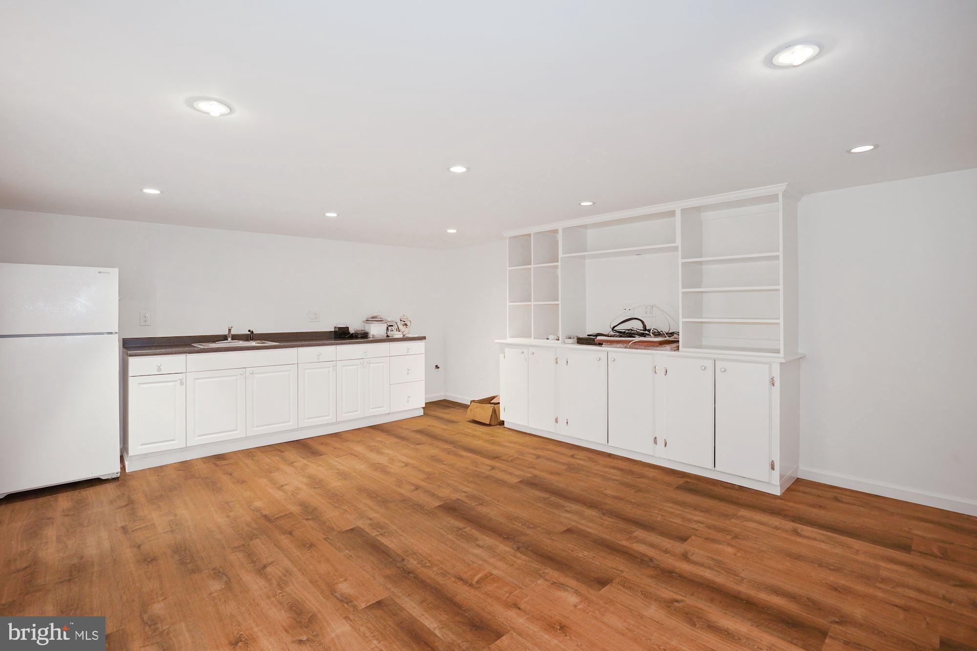 2805 Ontario Road Northwest Washington, DC 20009 - Photo 34 of 42 Recreation room with sink and refrigerator