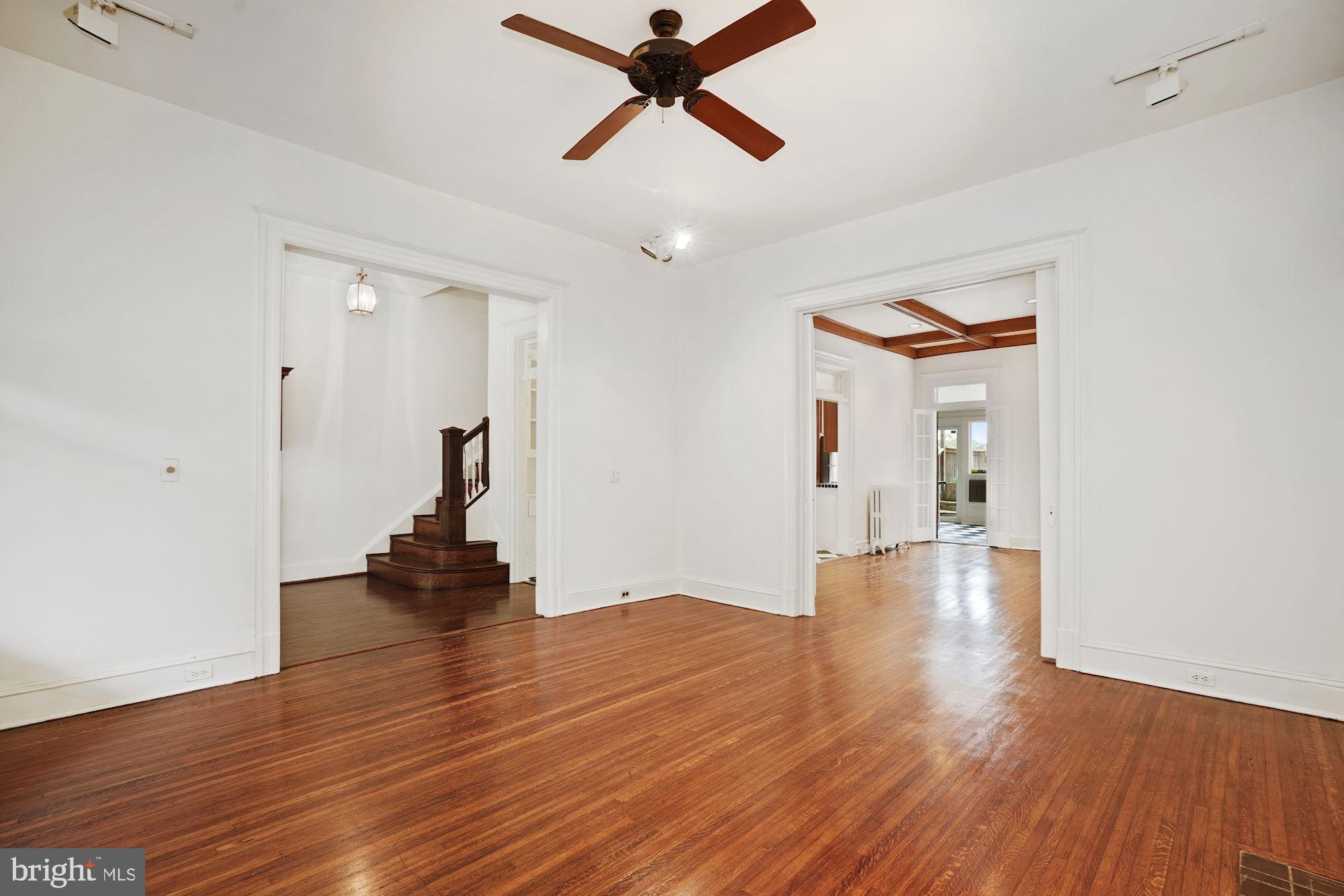 2805 Ontario Road Northwest Washington, DC 20009 - Photo 10 of 42 Track lighting an a breezy ceiling fan