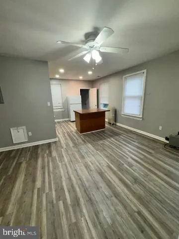 a bedroom with furniture and a bed