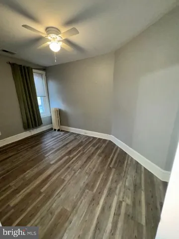 a view of a hallway with stairs