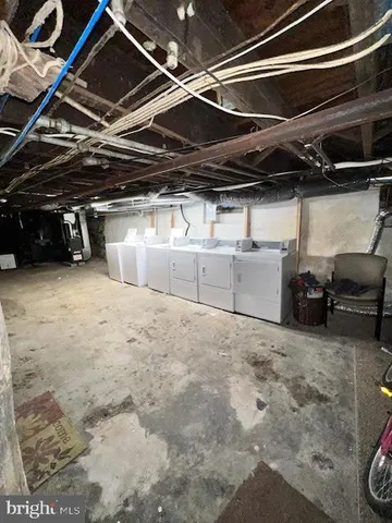 a view of a backyard with seating area