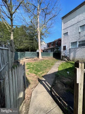 a front view of building with street