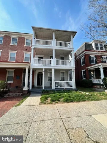 a view of a house with a swimming pool