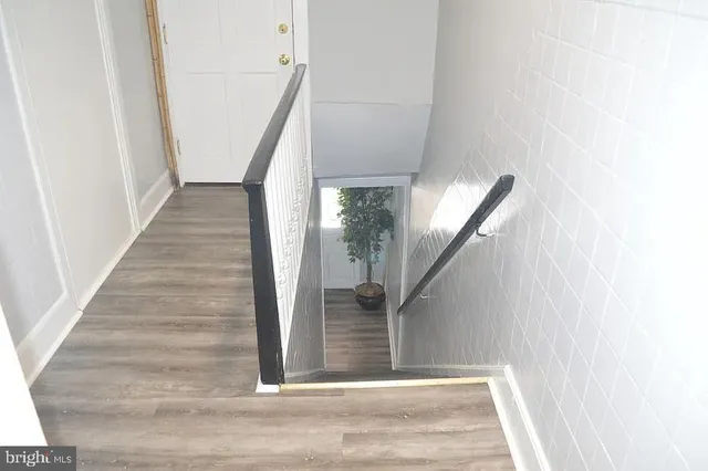 a close view of a utility room with washer and dryer