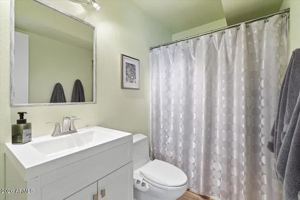 a workspace with furniture and chandelier