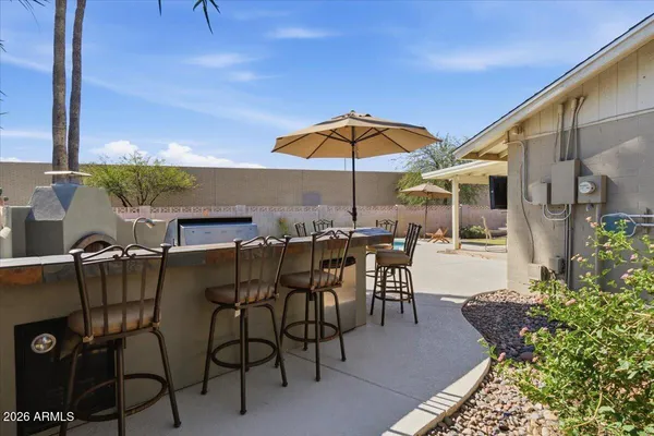 a view of a terrace with sitting area